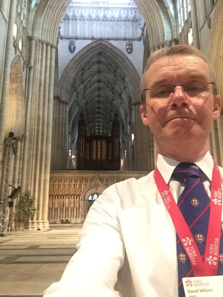 David on duty as a supernumerary virger at York Minster.