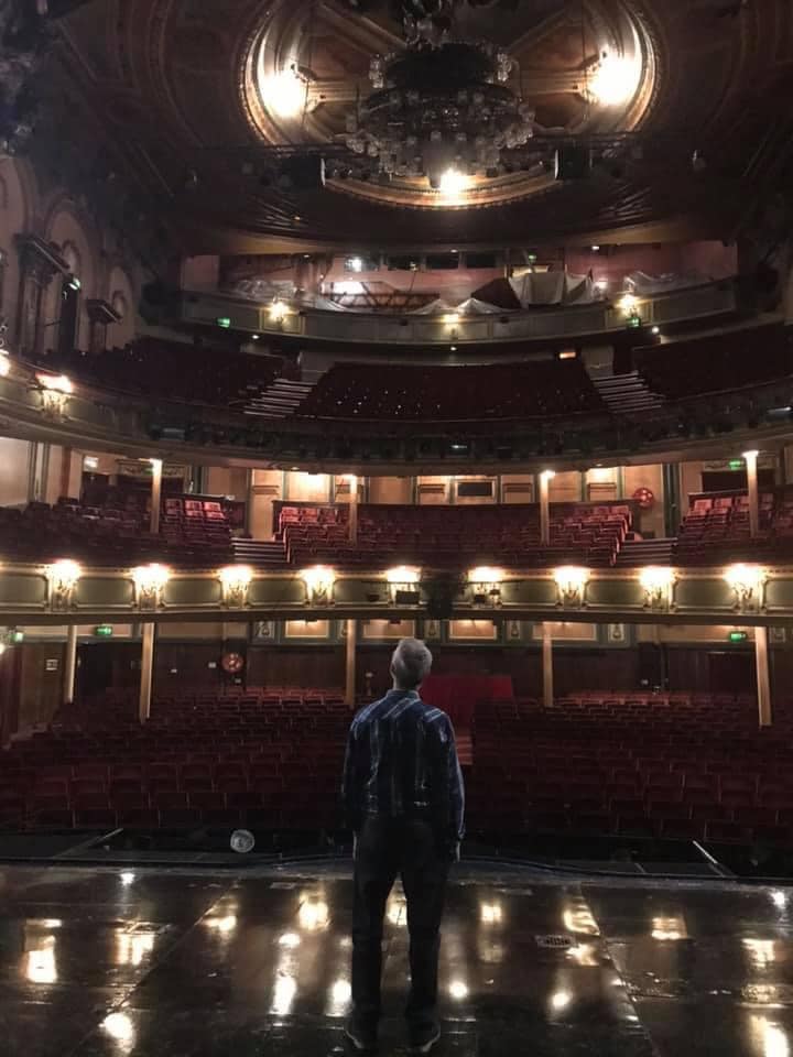 David on the stage of Her Majesty's Theatre.